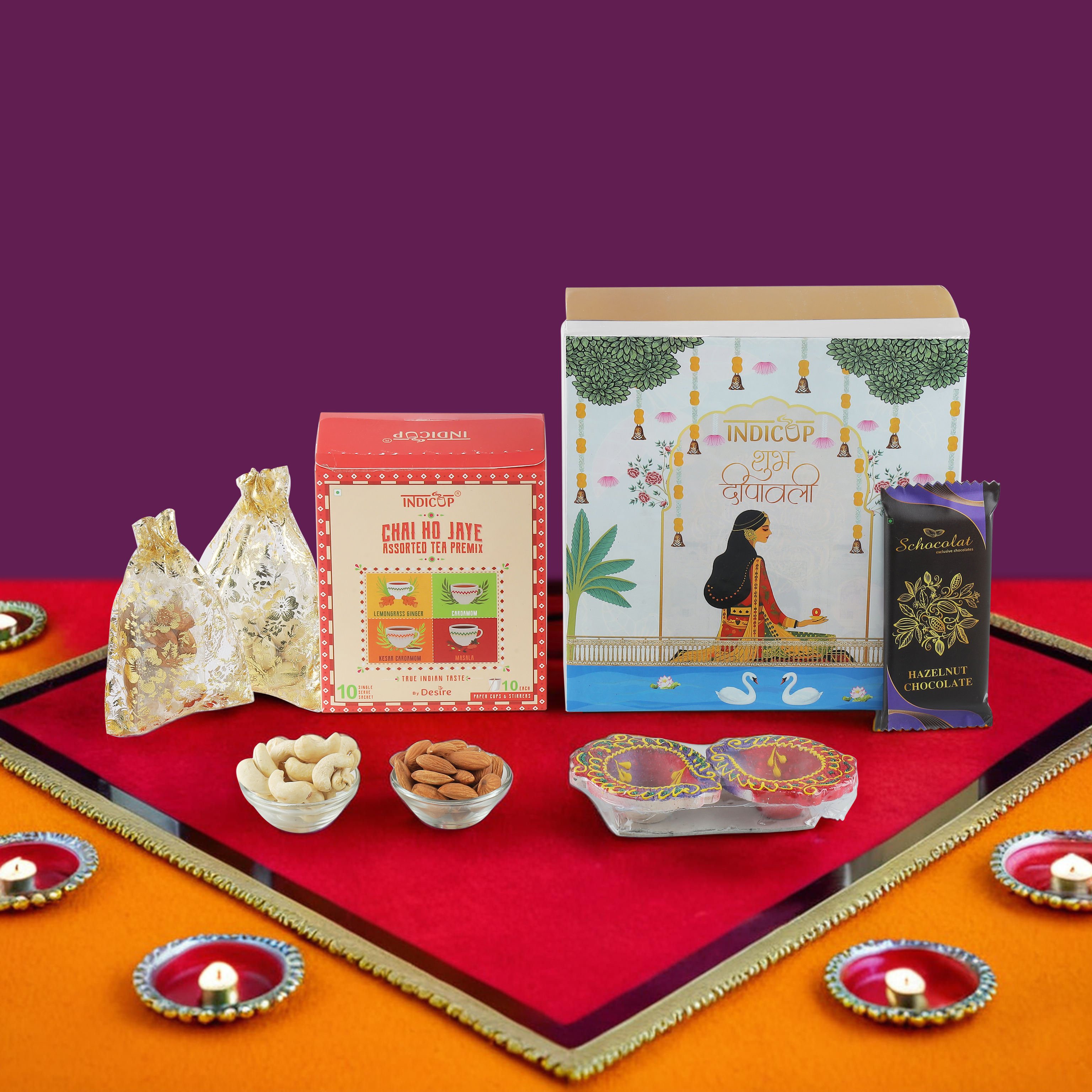 INDICUP Luxurious Diwali Gift Hamper - Premium Nuts, Assorted Tea Premix, Traditional Diyas & Chocolate - Perfect for Family and Friends, 500 gm